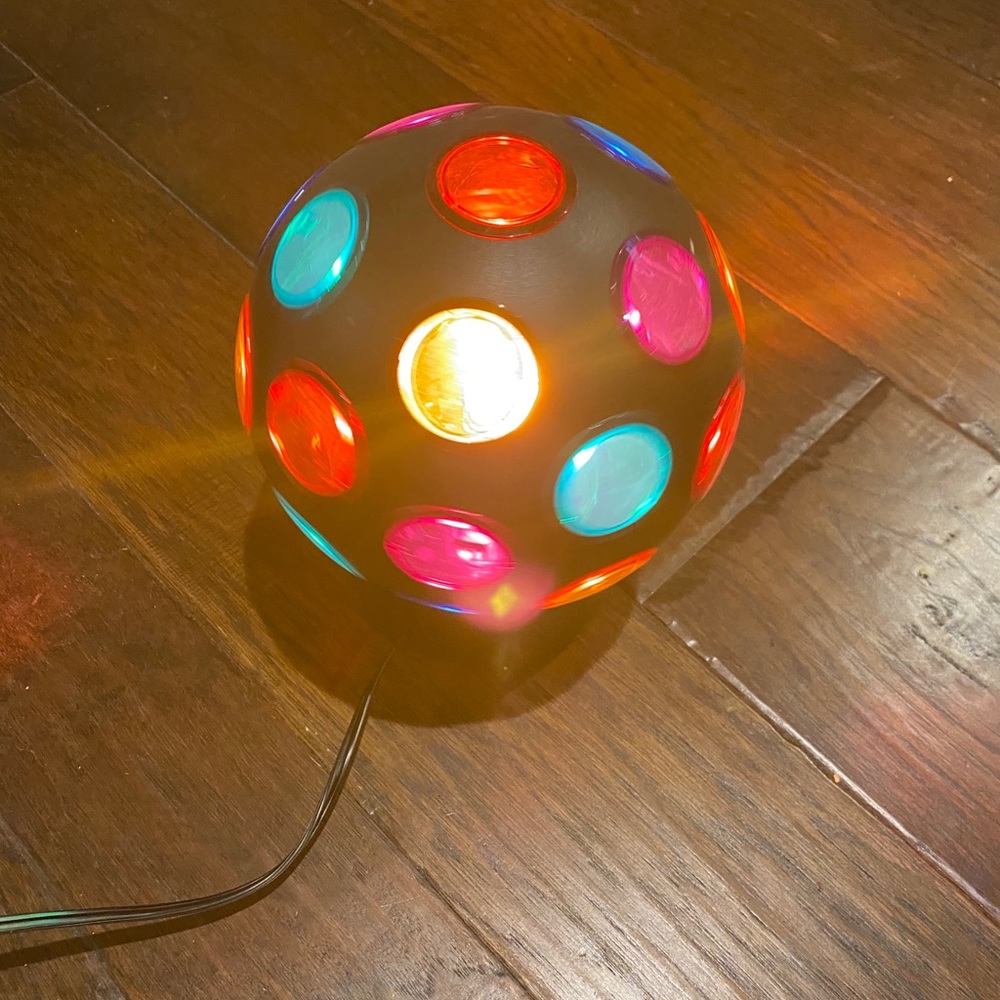 Spinning globe light